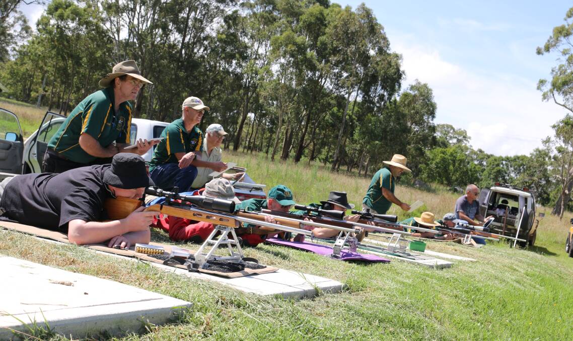 On target: Markers oversee the scoring of shooters during a championship round at the Bega Rifle Club last weekend. 