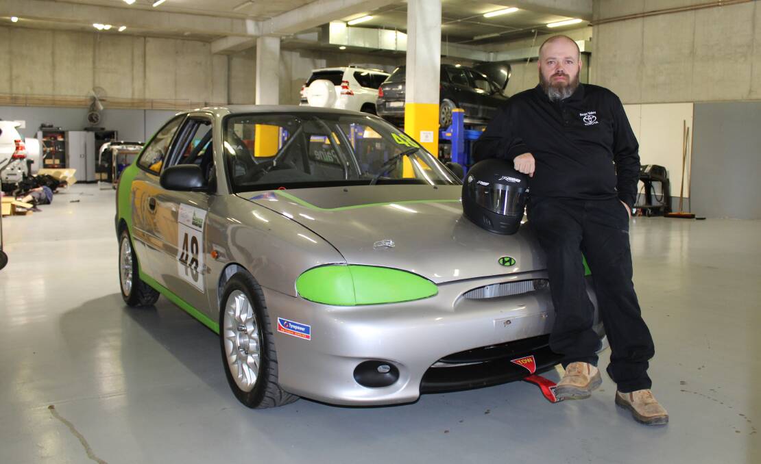 Ready to race: John Paine with his Hyundai Excel he will race from Friday in the SeriesX3 production car class at Goulburn's Wakefield Park. 