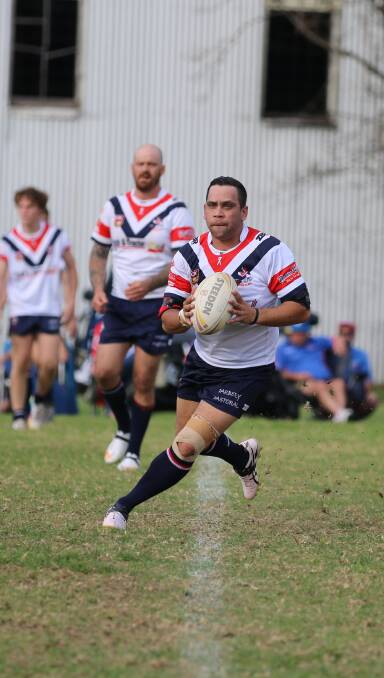 Heavy hitter: Reserve grade half Allan Aldridge makes a run for the Roosters during last week's win over Candelo-Bemboka. 