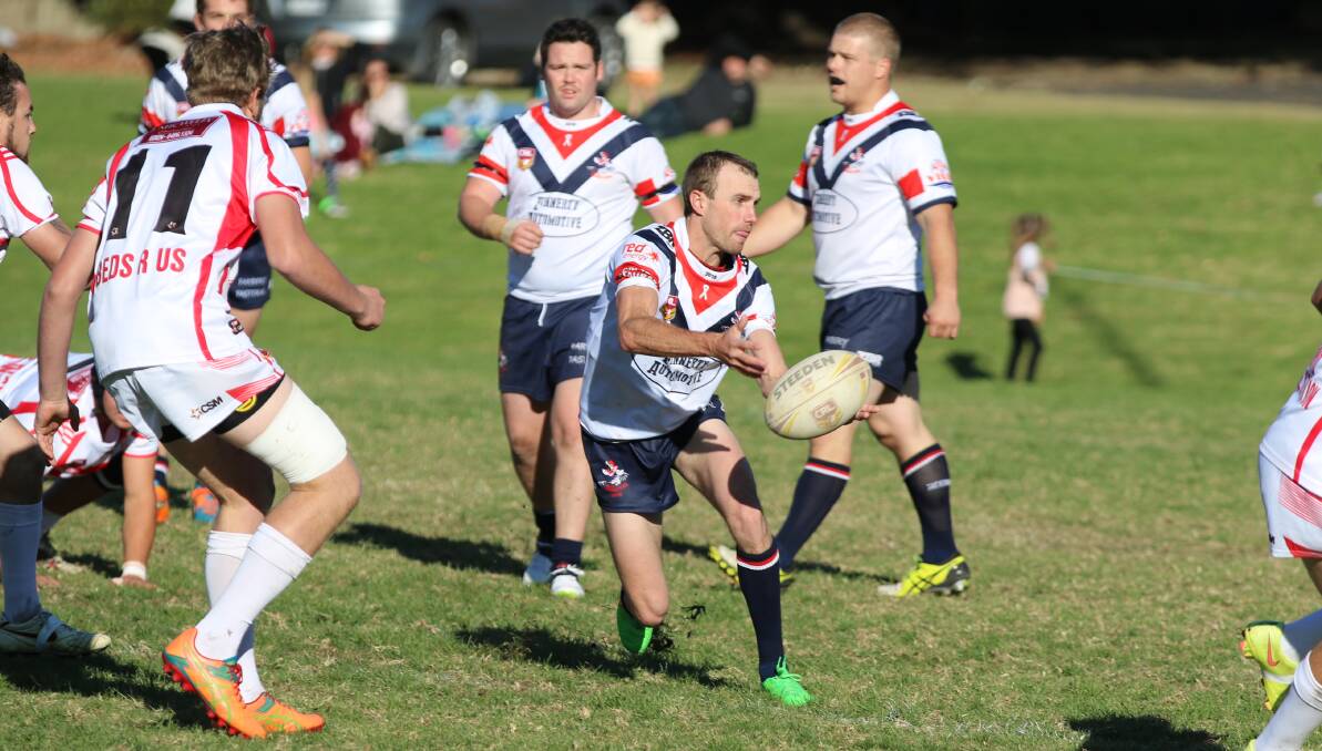 Bega Rooster Craig Dunham finds a gap in the Eden line and passes short for a team-mate to break through on Sunday. 