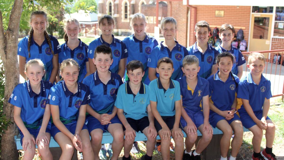 School team: St Pat's sporting stars who have reached the heights of swimming,  league, hockey, football and athletics this year. Picture: supplied. 
