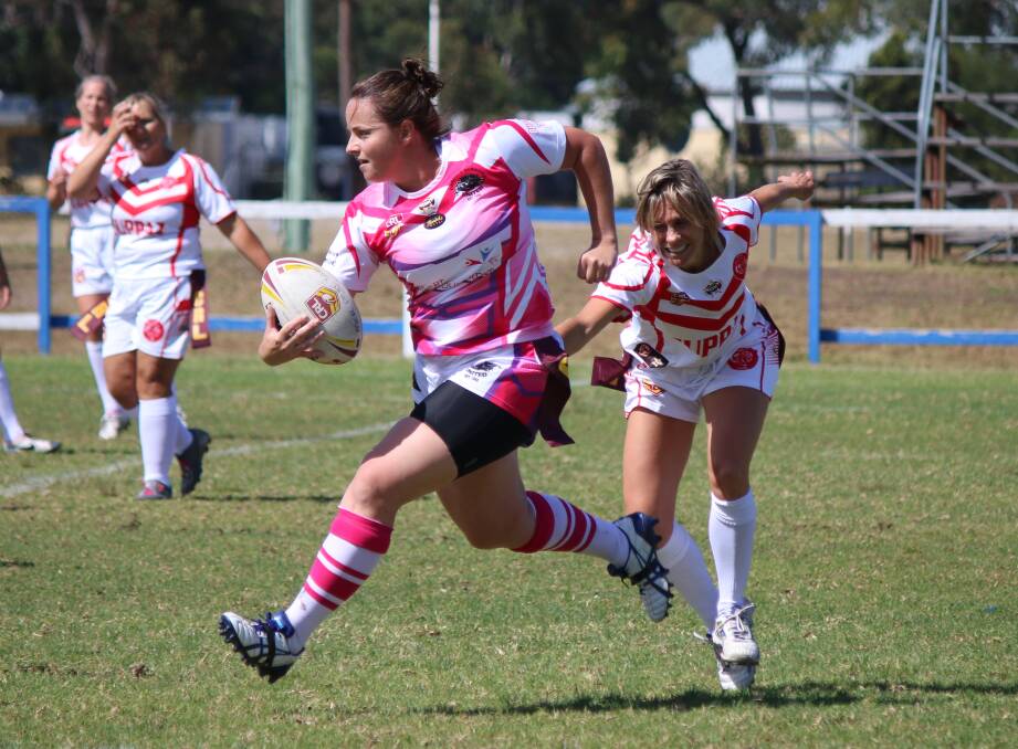 Panthers debut: Pink Panther Emma Irvin blasts past an Eden Tigerette rival in an early match for the Candelo-Bemboka women's side. 