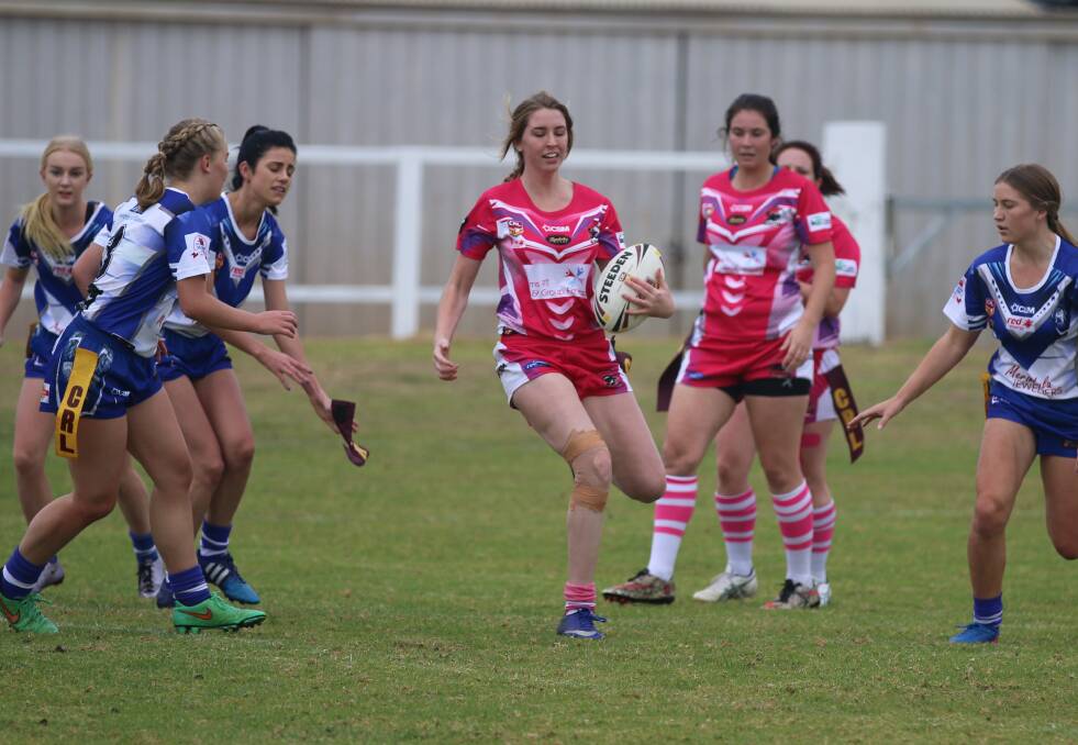 Tag: Candelo-Bemboka centre Larissa Horswell gets tagged by the Hot Doggies in their encounter last weekend with the Panthers hosting Bombala this Saturday. 