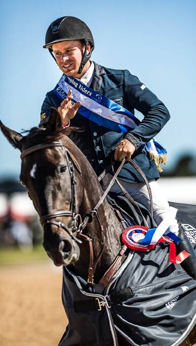 On top of the world: Clint Beresford and Emmaville Jitterbug with their sash and rug after winning the Australian World Cup. Picture: Stephen Mowbray.
