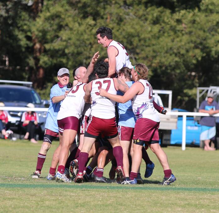 Sea Eagles players cheering a goal in a development grade match last season with good numbers around pre-season training. 