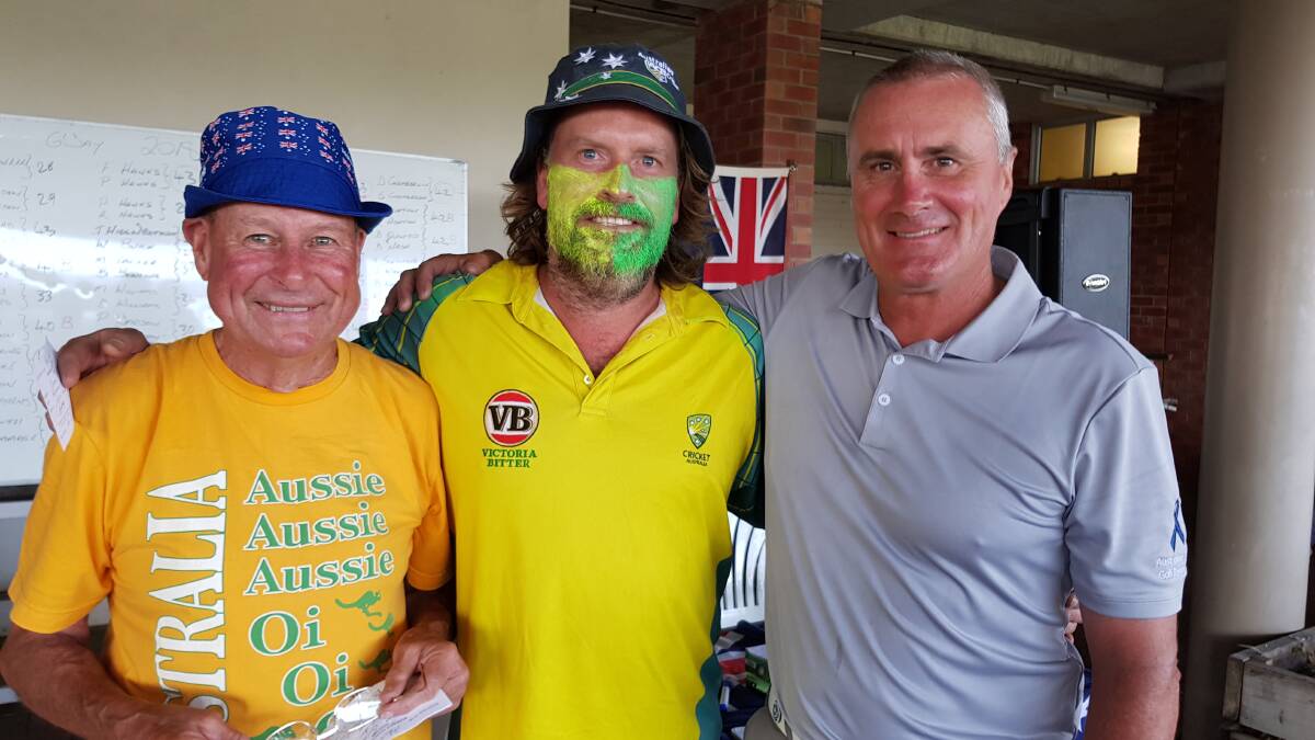 In the spirit: Men's golf president Ron Lye with Australia Day 4BBB winners Justin Higginbotham and Wayne Buick. 