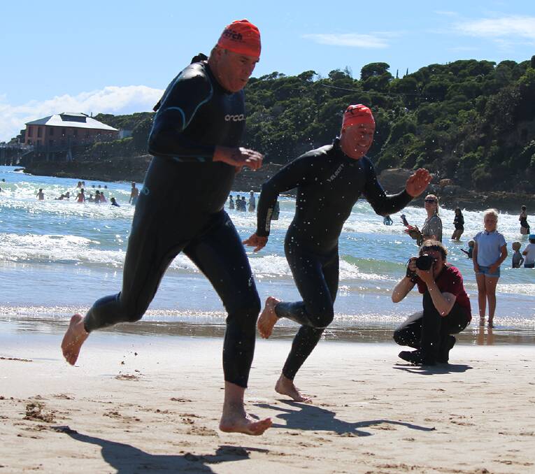 A mad dash up the beach can be the difference between first and second during age swims and the Splash for Cash.