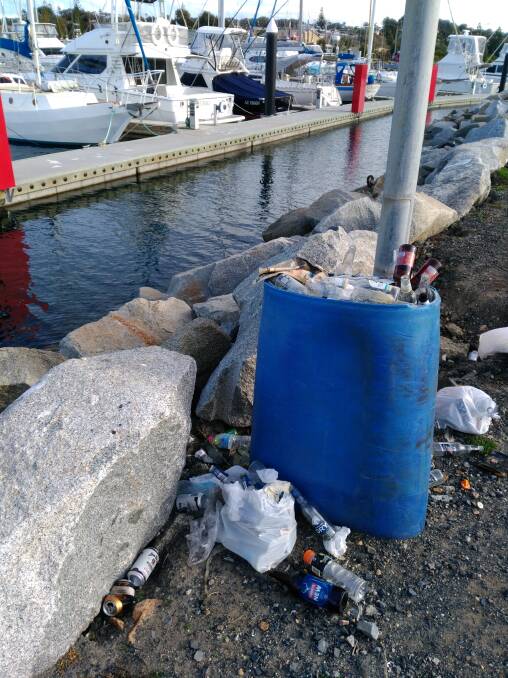 MAKESHIFT BIN: Multiple bags of rubbish were recovered from a site on the edge of Bermagui Harbour, after a report was from a member of the public. 