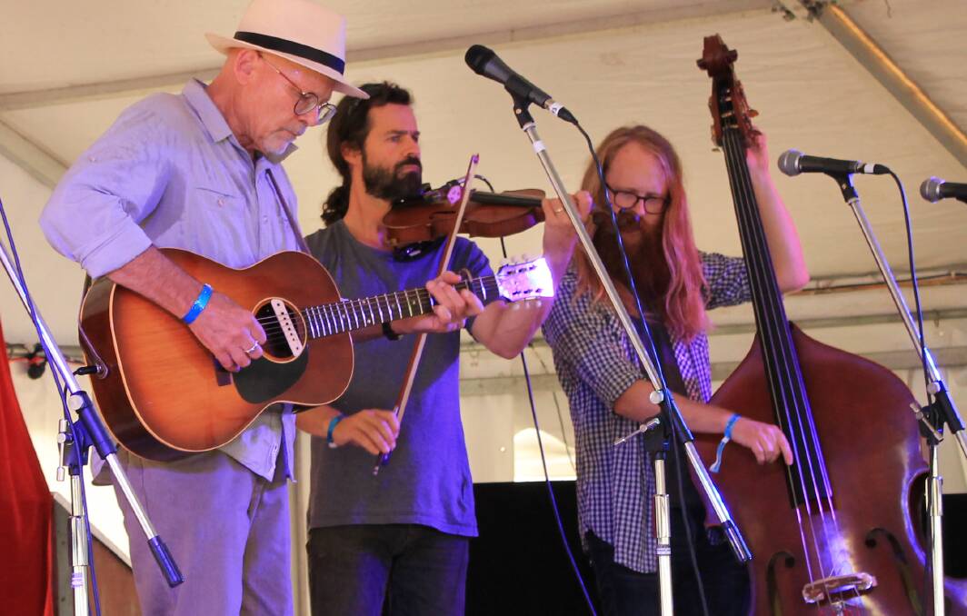 FRIENDSHIPS: Michael Menager and Friends perform on the Cobargo Folk Festival's Magpie stage on Saturday afternoon. Picture: Albert McKnight