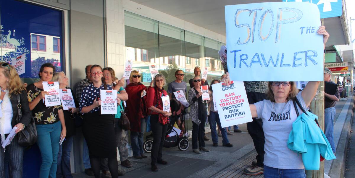 STANDING UP: Protesters outside Eden-Monaro MP Peter Hendy's office on Thursday after council passed a motion opposing factory freezer trawlers in local waters. Picture: Alasdair McDonald