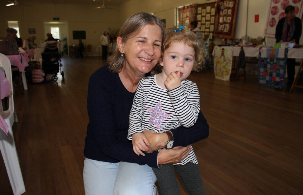 SUPPORTIVE: Kylie O'Neill of Angledale with her grandaughter Amaya of Tura Beach at Brogo's Biggest Morning Tea on Friday. Picture: Alasdair McDonald