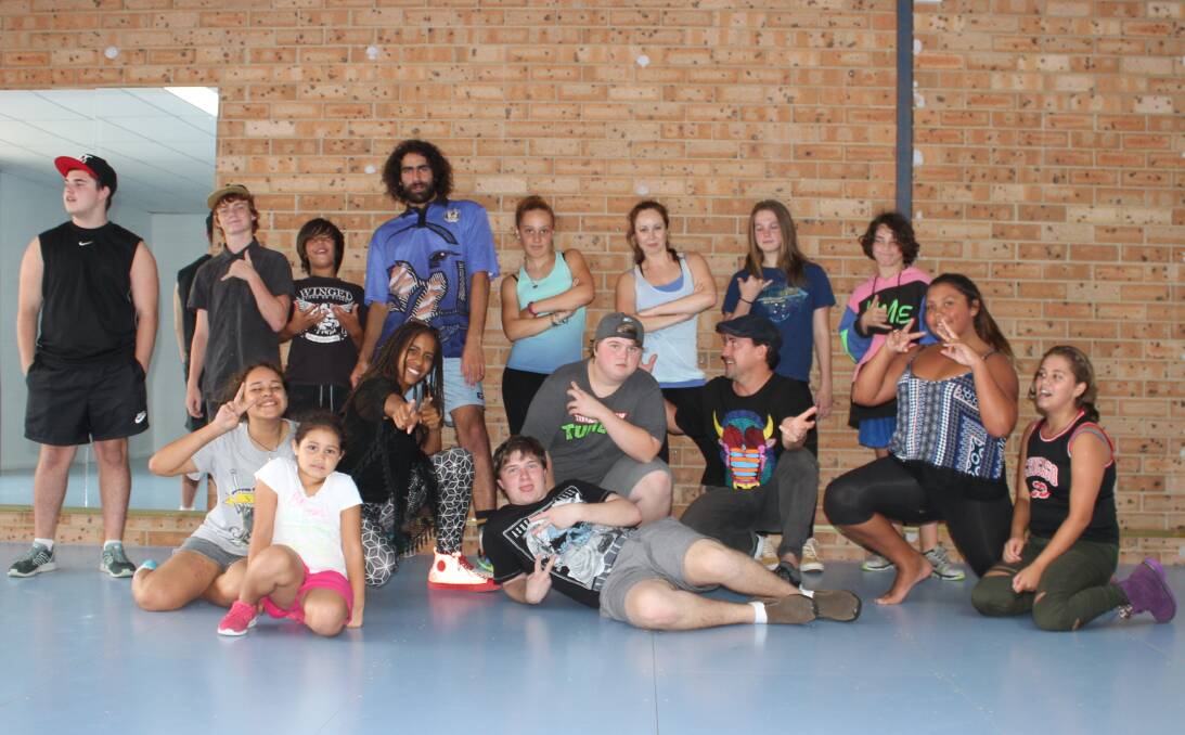 FUN: Kids from the Eden Youth Centre with members of the Bega and Wallaga Lake communities, youth workers Nathan Lygon and Timika Michelin, Funhouse Studio director Cayce Hill and hip-hop artist Morganics.
