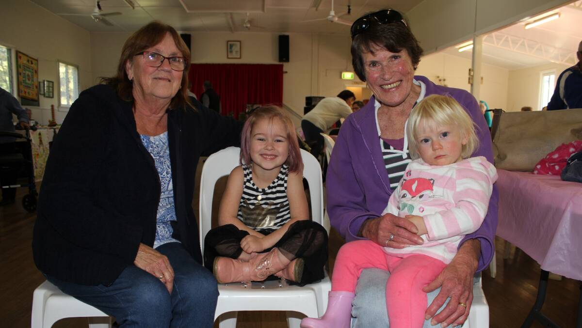 Maree and Amelia Walsh of Wolumla with Bea Bagguley of Bega and Charlotte Rowe of Cooma at Brogo's Biggest Morning Tea on Friday. Picture: Alasdair McDonald