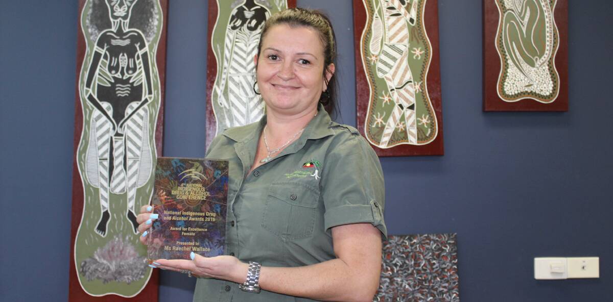 SURPRISED: Wandarma Aboriginal Drug and Alcohol Service's Raechel Wallace with her national award for excellence. Picture: Alasdair McDonald