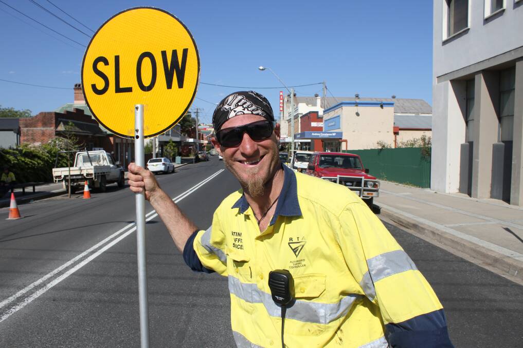 Platinum Traffic Control Services’ Stu Bertram has been keeping delayed motorists ín the 'loop' and 'happy' all week while the towns roads are repaired.