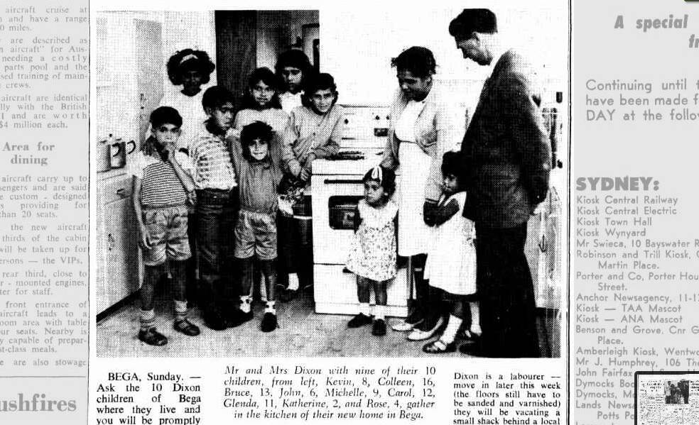 Eric Bruce Dixon with his wife Margaret and children Kevin, 8, Colleen, 16, Bruce, 13, John, 6, Michelle, 9, Carol, 12, Glenda, 11, Katherine, 2, and Rose, 4 in their new home in January 1968. Picture: Canberra Times.