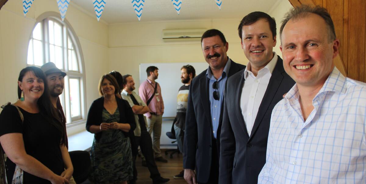 CREATIVE SPACE: Chief coordinator of the Bega co-working space Liam O'Duibhir (right) chats with opposition start-ups and digital innovation spokesman Ed Husic and Mike Kelly at Friday's opening. Picture: Alasdair McDonald