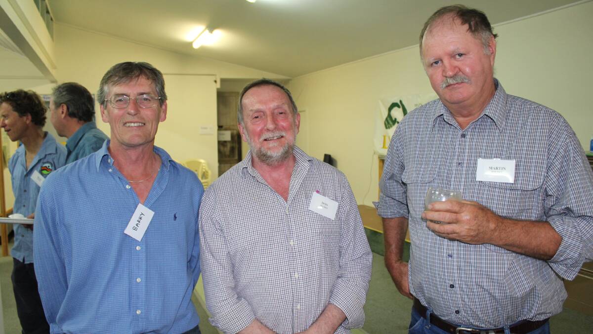 NEW HOME: Landcare's Barry Casey, Don McPhee chat with president Martin Bourke on Friday. Picture: Alasdair McDonald