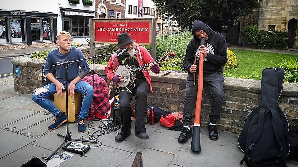 Rodney 'Murrum' Kelly (right) busks in Cambridge during his recent trip to the United Kingdom. Picture: Supplied