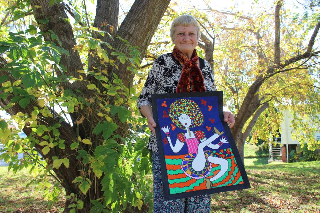 BUILDING A REPUTATION: Bega artist Miriam Kydd with her recently completed piece titled Mardi Gras Dancer. Picture: Alasdair McDonald