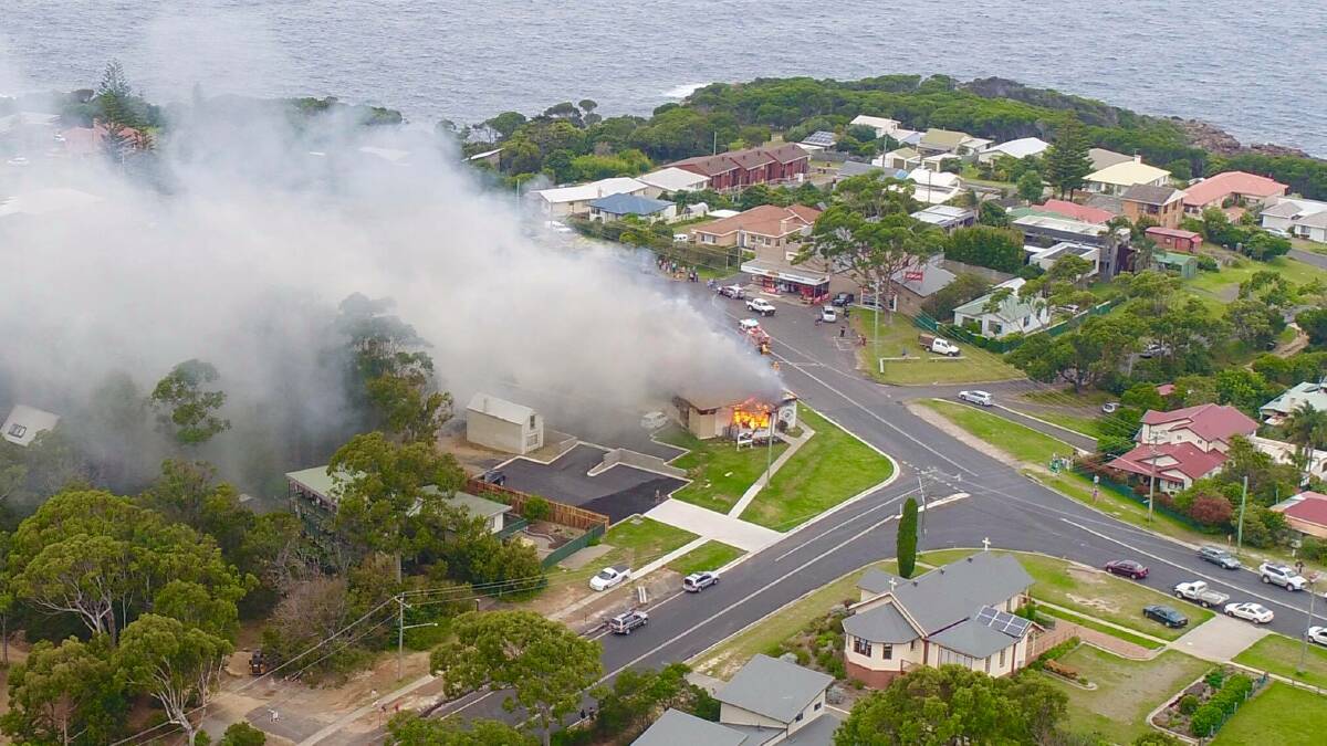 TATHRA FIRE: An aerial view of this weeks tragic fire in Tathra that destroyed three local businesses. Photo: Terry and Kim Dixon