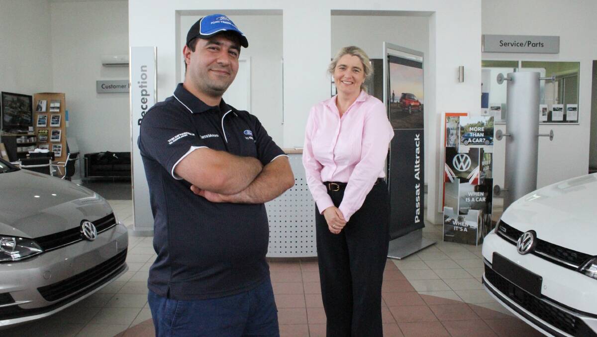 SAFE HAVEN: Hami Shafei takes a break with Gudrun Stylianou inside Bega's Tarra Motors. Picture: Alasdair McDonald