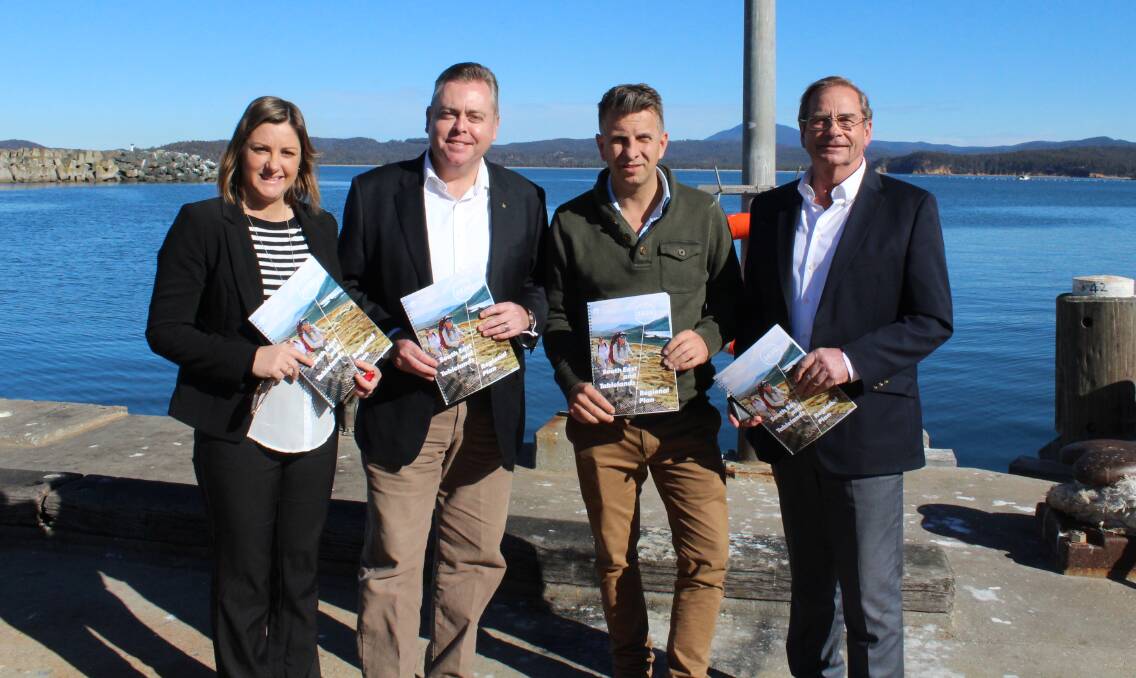 Bega Valley Shire Council mayor Kristy McBain, Planning and Housing Minister Anthony Roberts, Transport and Infrastructure Minister Andrew Constance and Queanbeyan-Palerang regional administrator Tim Overall at Eden Wharf on Friday, July 7.

