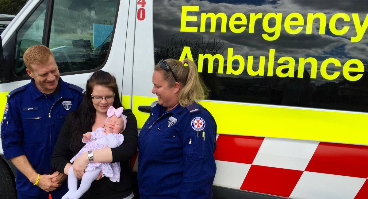 OH EVIE: Bombala Station paramedics Jason Wood and Sandra Lavender with mum Jodie Talbot and baby Evie.