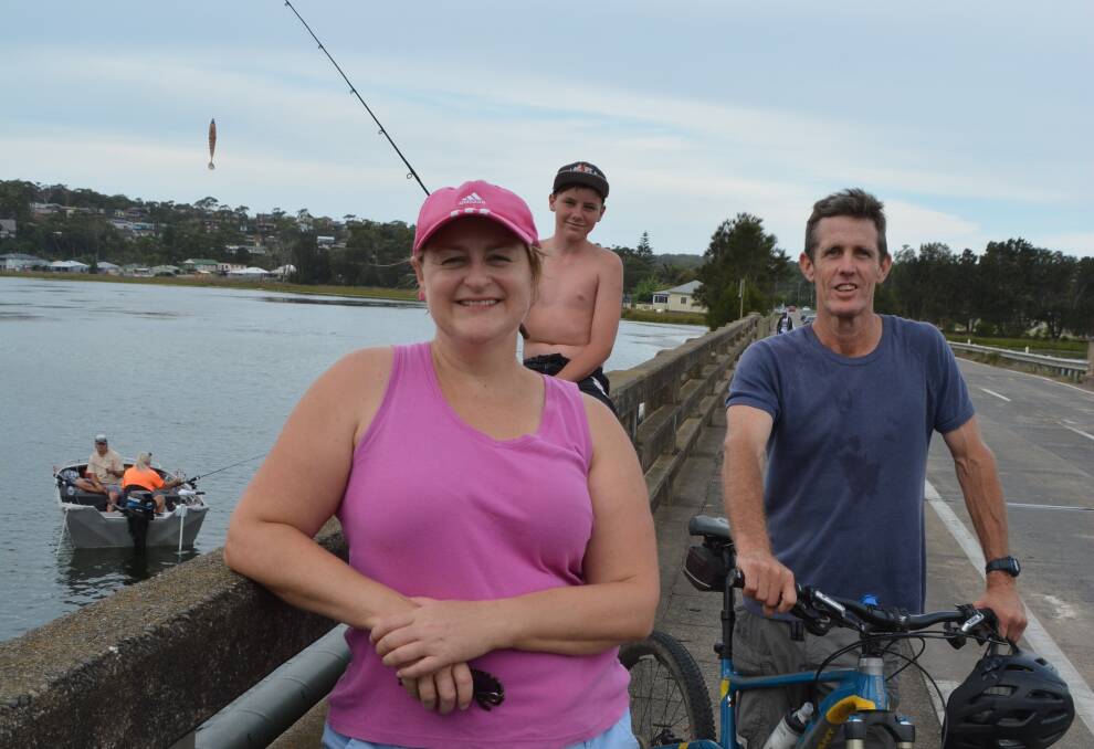 LIKING IT: Relaxed boat fishermen, Lisa Boisett, Codin O’Sullivan and Paul O’Brien are glad the old Burrill Lake bridge’s days are finally numbered.