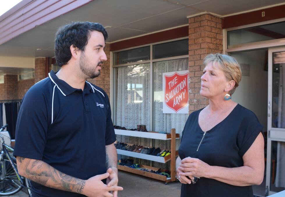 CONCERNED: The Salvos' Ulladulla officer Jake Clanfield and store manager Linda Salafia see falling living standards and increasing financial stress among local clients.