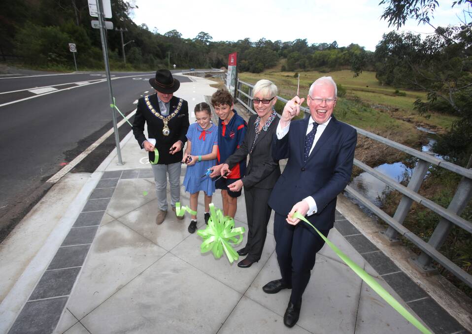 Dignitaries cutting the ribbon in 2016 for the Cordeaux Road upgrade - the region's only project to receive funding under the Resources for Regions program. Picture: Robert Peet