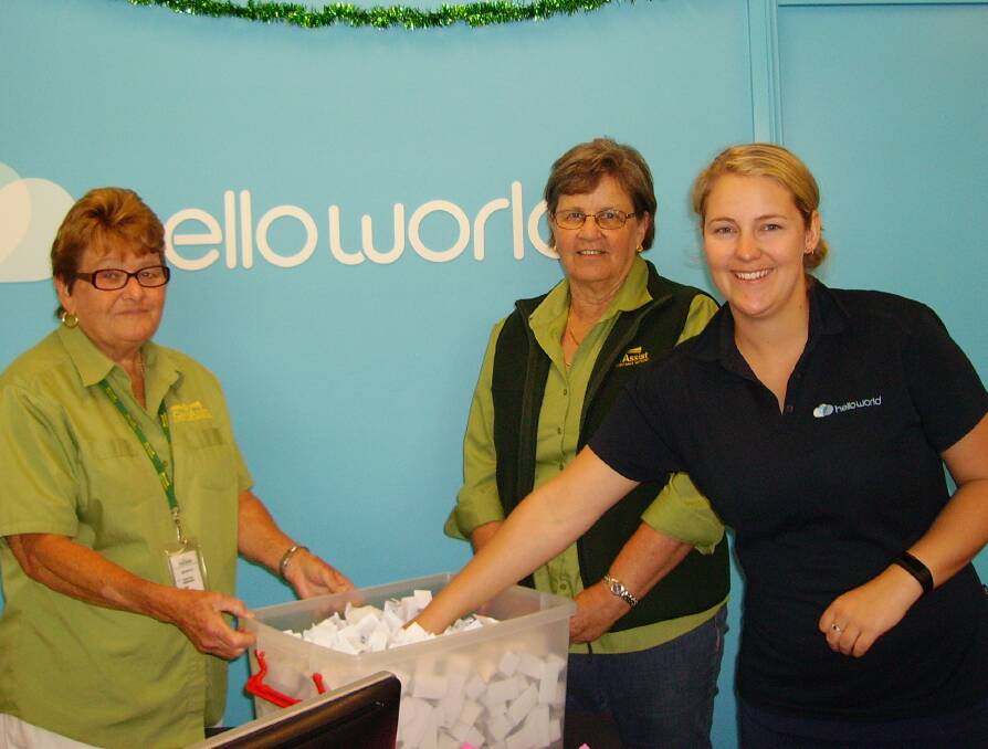 CAN ASSIST RAFFLE DRAW: Jan Horneman, Irene Hetherington and Sarah Bond. The first prize of a $2000 travel voucher from Bega Helloworld was won by Donna Snowden. 