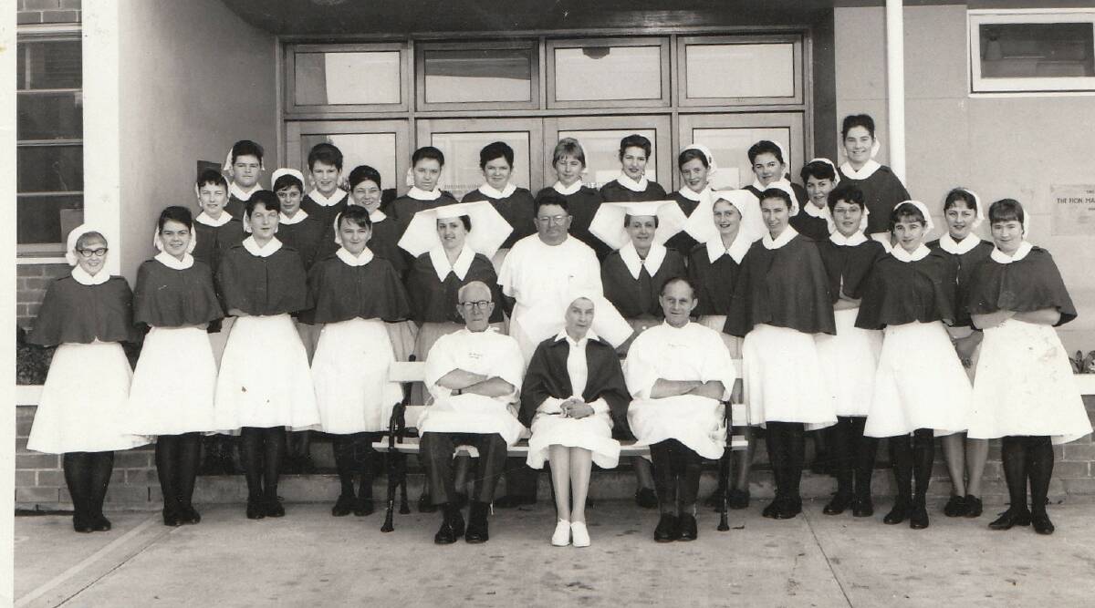 New hospital at last: Dr Ted Blomfield, seated right centre, with Dr McKee, Matron, and the nursing staff at the then new Bega District Hospital.