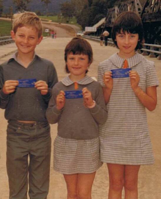 Mementoes: Schoolchildren displaying their souvenir ribbons. 