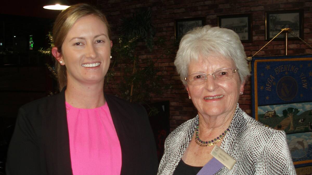 Samantha Matthews (left), guest speaker at VIEW Club's August dinner, was presented with a small gift of appreciation by club member Jann McNeil.