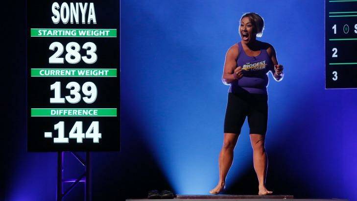 A contestant celebrates her weight loss on the most recent season finale of <i>The Biggest Loser</i> US. Photo: NBC via Getty Images