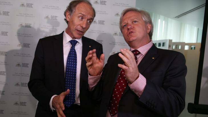 Chief Scientist Alan Finkel (left) and ANU Vice-Chancellor Brian Schmidt celebrate the detection of gravitational waves at Parliament House on Friday. Photo: Andrew Meares
