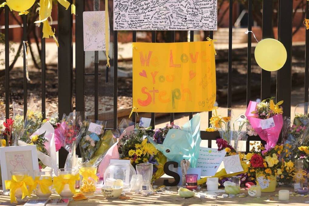 Messages from friends, students and the community to murdered Leeton school teacher Stephanie Scott and her family on the fence in front of Leeton High School where she was last seen on Easter Sunday.  Photo: Kate Geraghty
