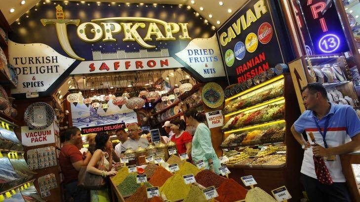 Tourists at a store at the Spice market, also known as the Egyptian Bazaar, in Istanbul. Photo:  Reuters
