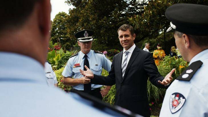 Premier Mike Baird said the workers came to the state's aid in "the darkest of hours". Photo: Christopher Pearce