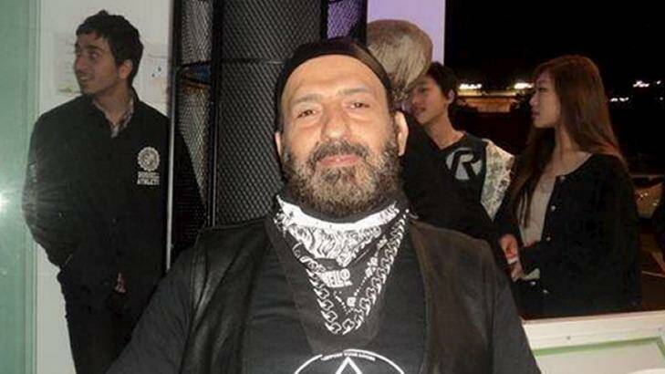 Man Monis dressed in garb from a chapter of the Rebels Outlaw Motorcycle Club.  Photo: Department of Justice