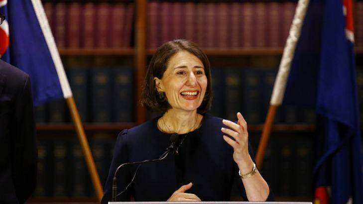 Gladys Berejiklian smiles at a press conference on Monday.  Photo: Daniel Munoz