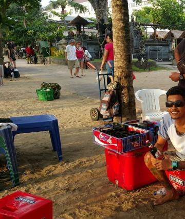 "Bali can sell beers, they can still relax by the beach and buy cool Bintang there." Kuta beach vendor Kadek Nova assures his customers. He's pictured with Gede Bayu (black T-shirt) and Kadek Lucky.  Photo: Amilia Rosa