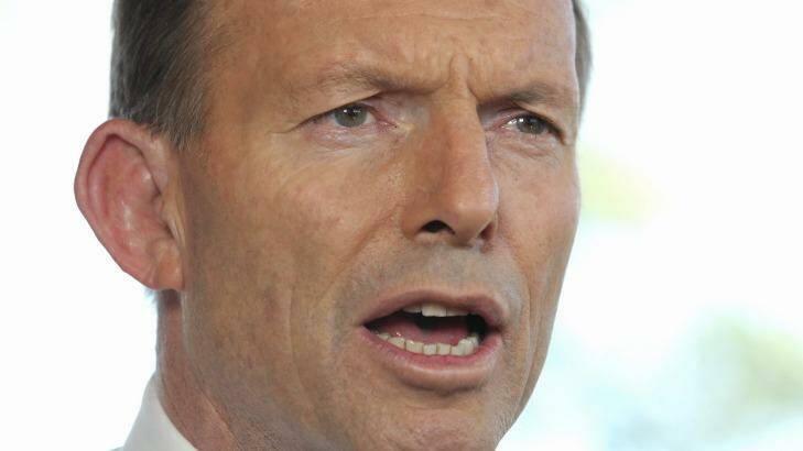 Prime Minister Tony Abbott hit the airwaves on Monday morning to explain his decision to commit 600 Australians to take part in action to destroy the Islamic State. Photo: Alex Ellinghausen