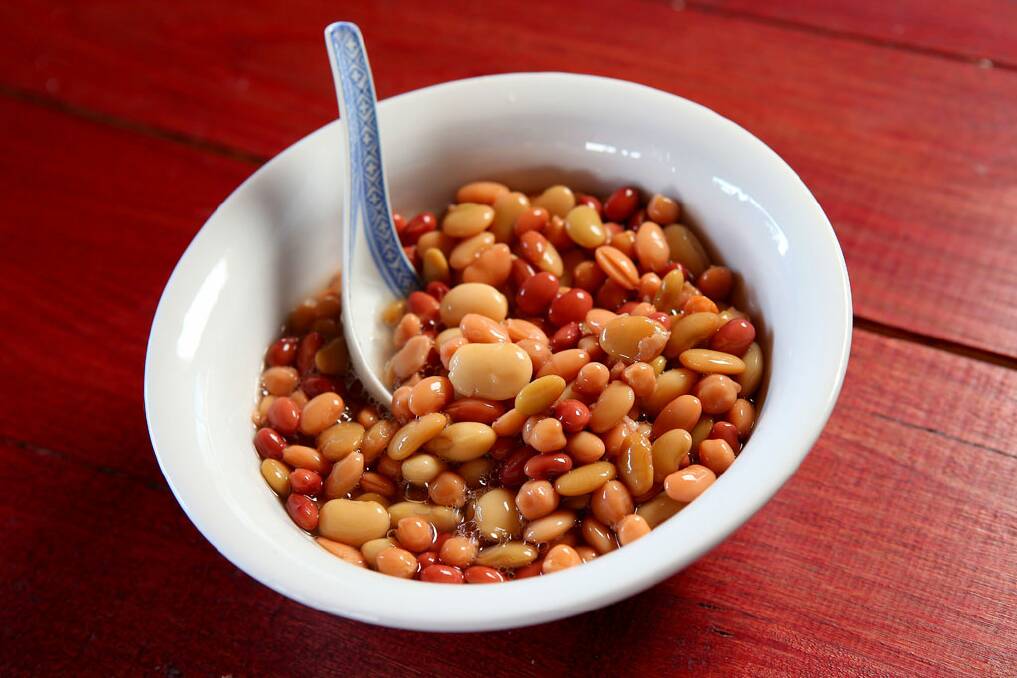 Beans are a staple in his kitchen. Sometimes he'll have garlicky beans mixed with butter and mirin, which he serves with yoghurt, greens, horseradish and cevapcici sausages.