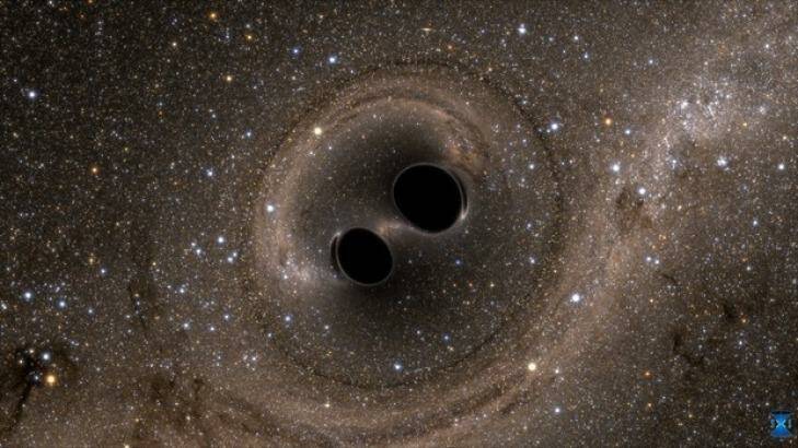 A simulation of two black holes colliding. Photo: LIGO