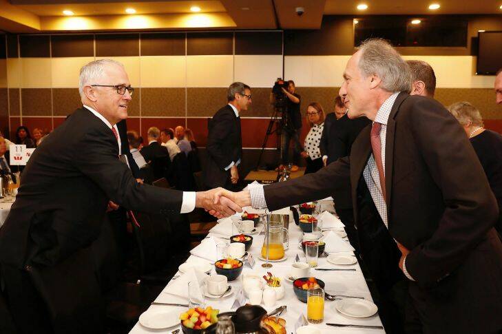 Prime Minister Malcolm Turnbull greets Chief Scientist Dr Alan Finkel during the Ai Group Energy Breakfast, at the National Press Club of Australia, in Canberra on Thursday 19 October 2017. fedpol Photo: Alex Ellinghausen 