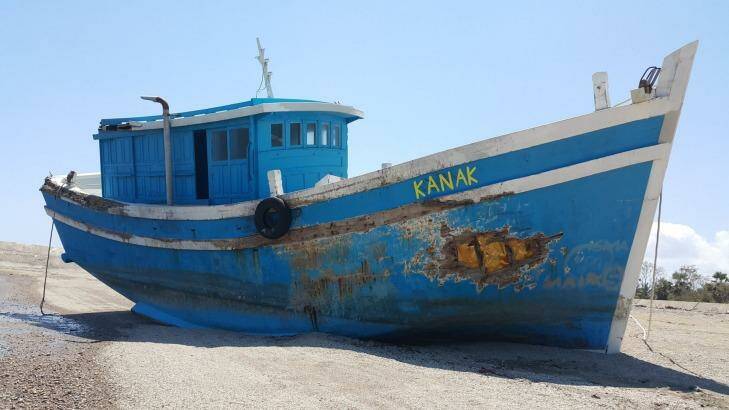 The Kanak, the boat that was stranded on the reefs near Landu Island after Australian officials allegedly paid people smugglers to return to Indonesia. Photo: Amilia Rosa