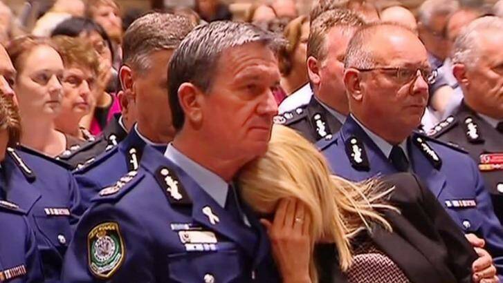 Police Commissioner Andrew Scipione with his wife Joy at a memorial service for the victims of the siege in Martin Place. Photo: Channel 9