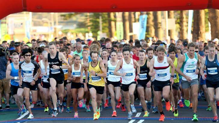 And they're off: More than 5500 competitors took part in the Sun Run. Photo: Damian Shaw